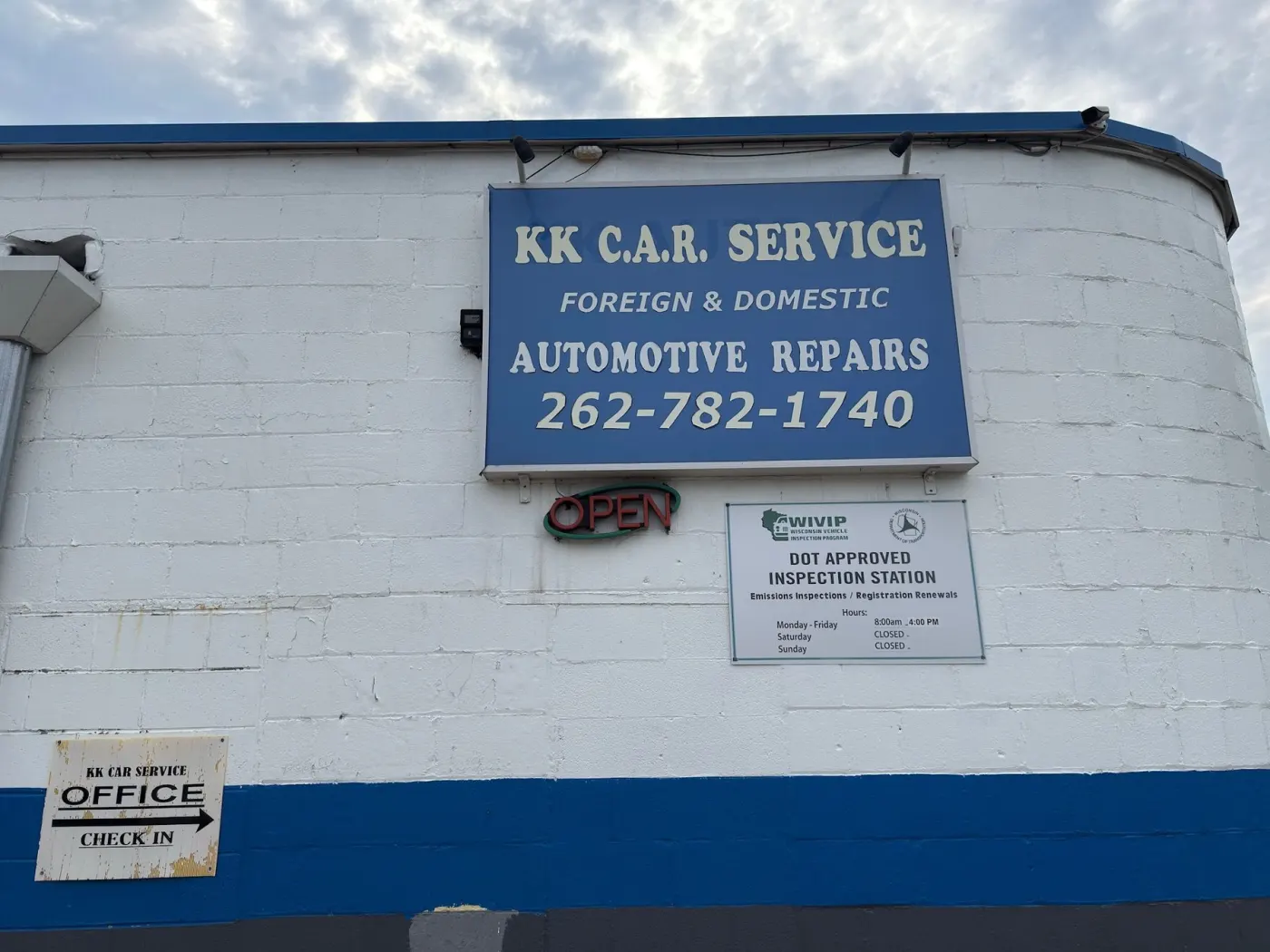 KK C.A.R Service sign on the building