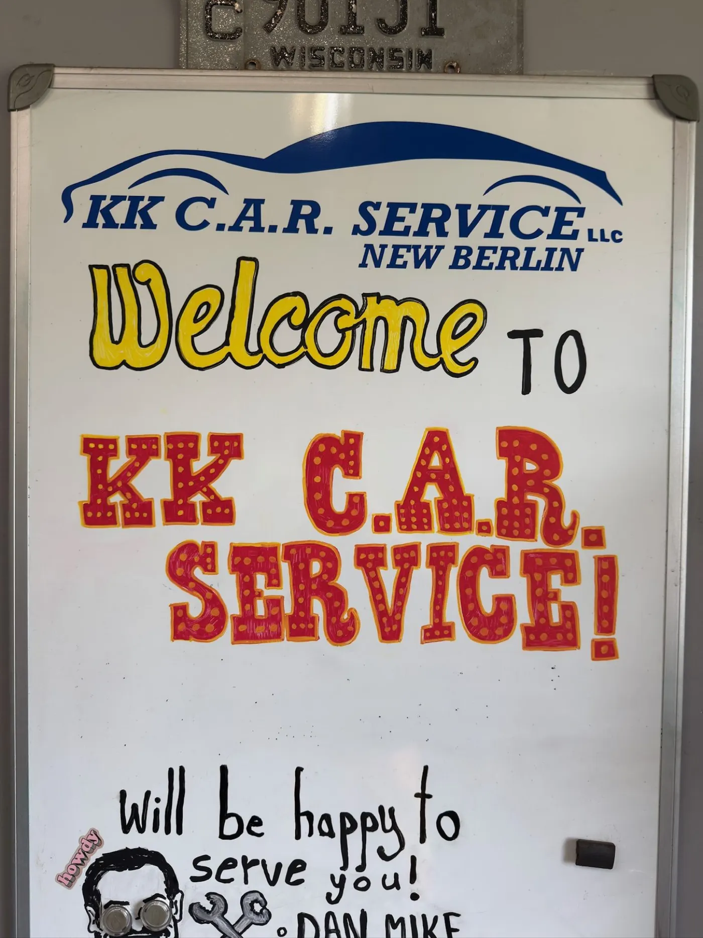 Hand-lettered welcome board
